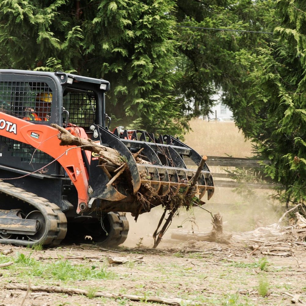 Kubota-SVL75-With-Quick-Claw-Rake-4-scaled